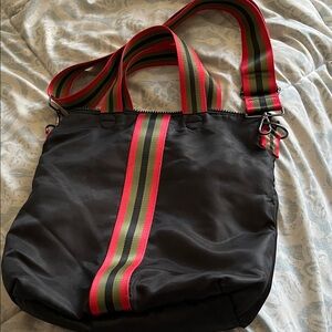 HAUTE SHORE Black Messenger Bag with Red and Green Stripe